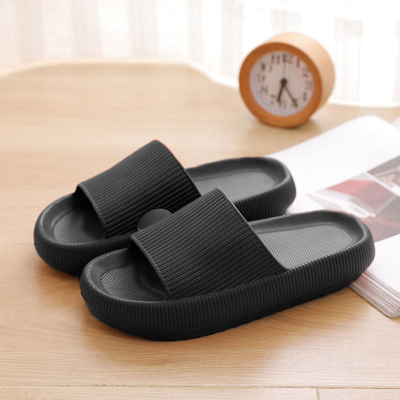 Men's cloud slippers; shower slippers in home bathroom