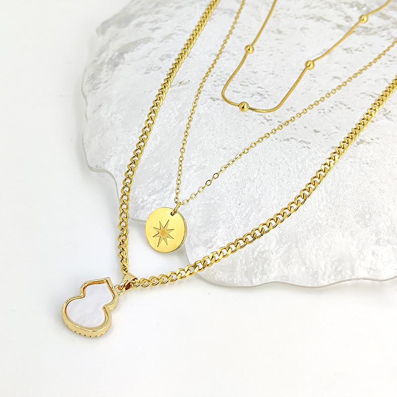 2023 new multi-row stacked set of European and American fashion personality titanium steel does not lose color micro-set gourd hexagram pendant