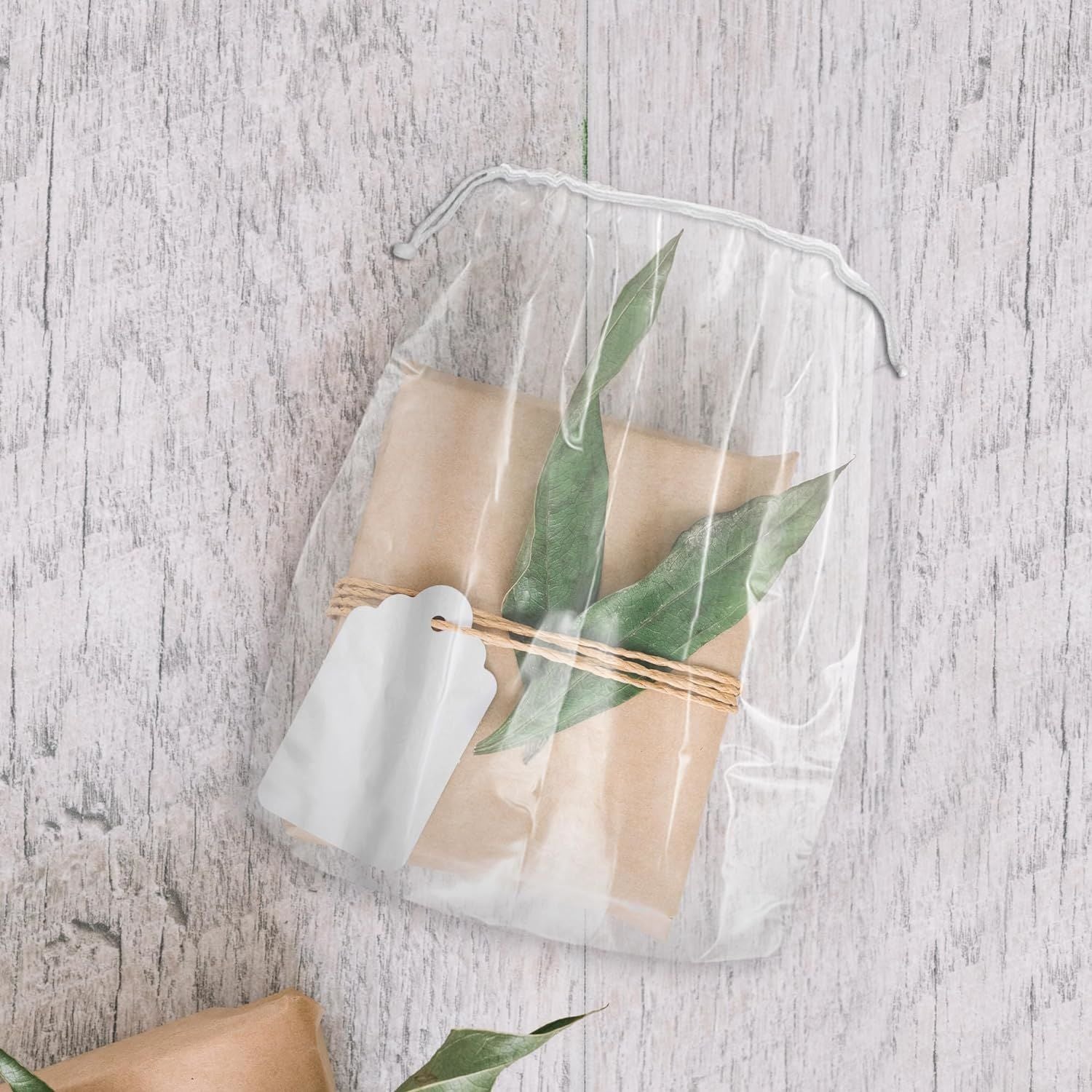 Clear Plastic Drawstring Bags 5" x 8"; Pack of 100 Clear Bags for Gifts 2 Mil Polyethylene Drawstring Gift Bags; Water-Resistant Plastic Shoe Bags 5x8