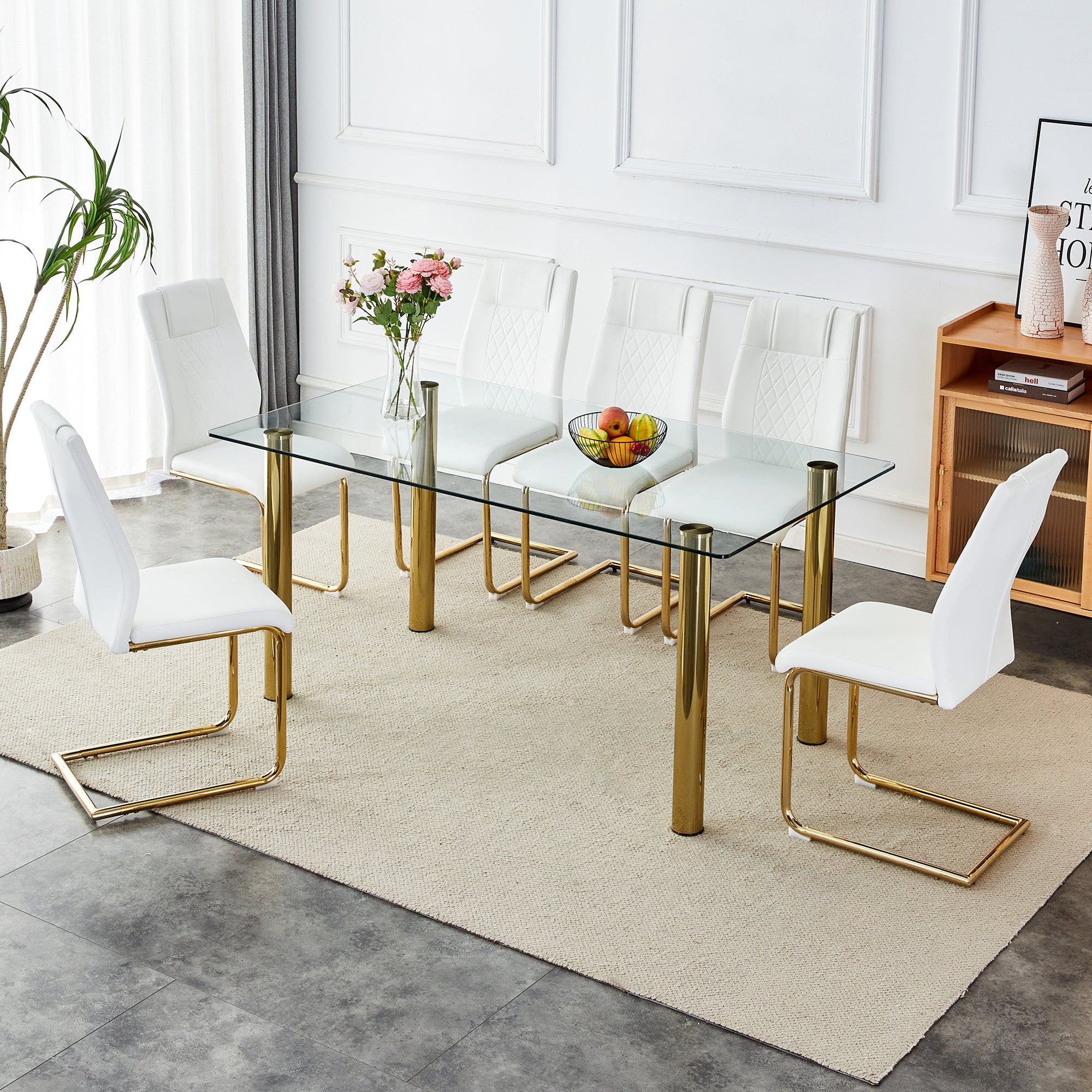 1 table with 6 chairs, transparent tempered glass tabletop, thickness 0.3 feet, golden metal legs, paired with white PU backrest cushion chair, golden plated metal legs.T-003 C-001