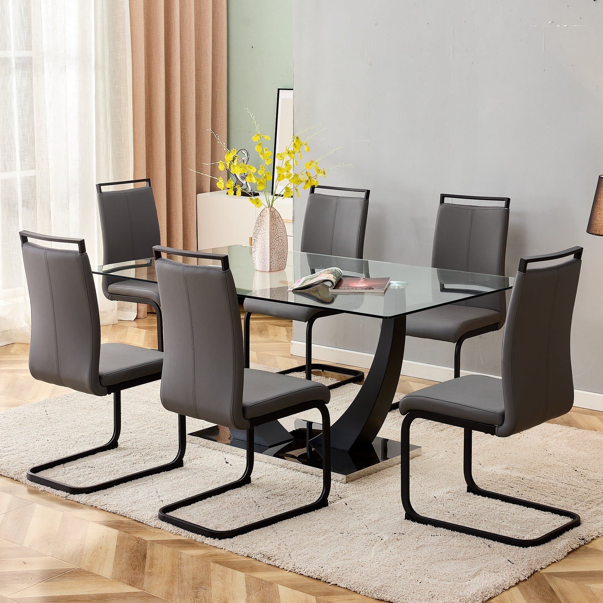 1 table and 6 chairs set.Large rectangular 0.4 "tempered glass tabletop, black metal bracket dining table. Paired with 6 modern PU artificial leather high backrest soft cushion with black metal legs.