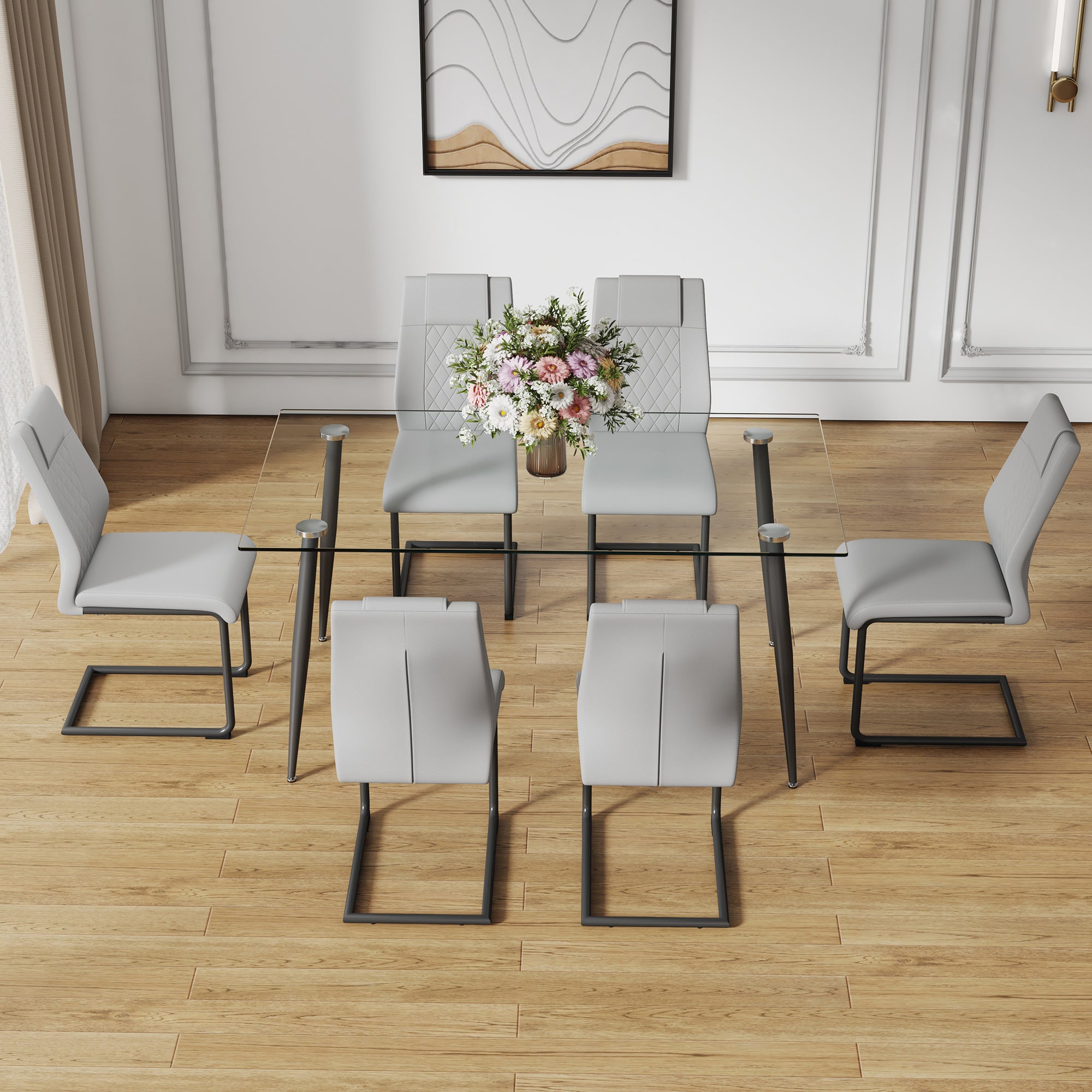 1 table and 6 chairs set.Rectangular table with transparent tempered glass tabletop and black metal legs.Paired with 6 chairs with PU leather cushioned seats and black metal legs.DT-1544 C-001