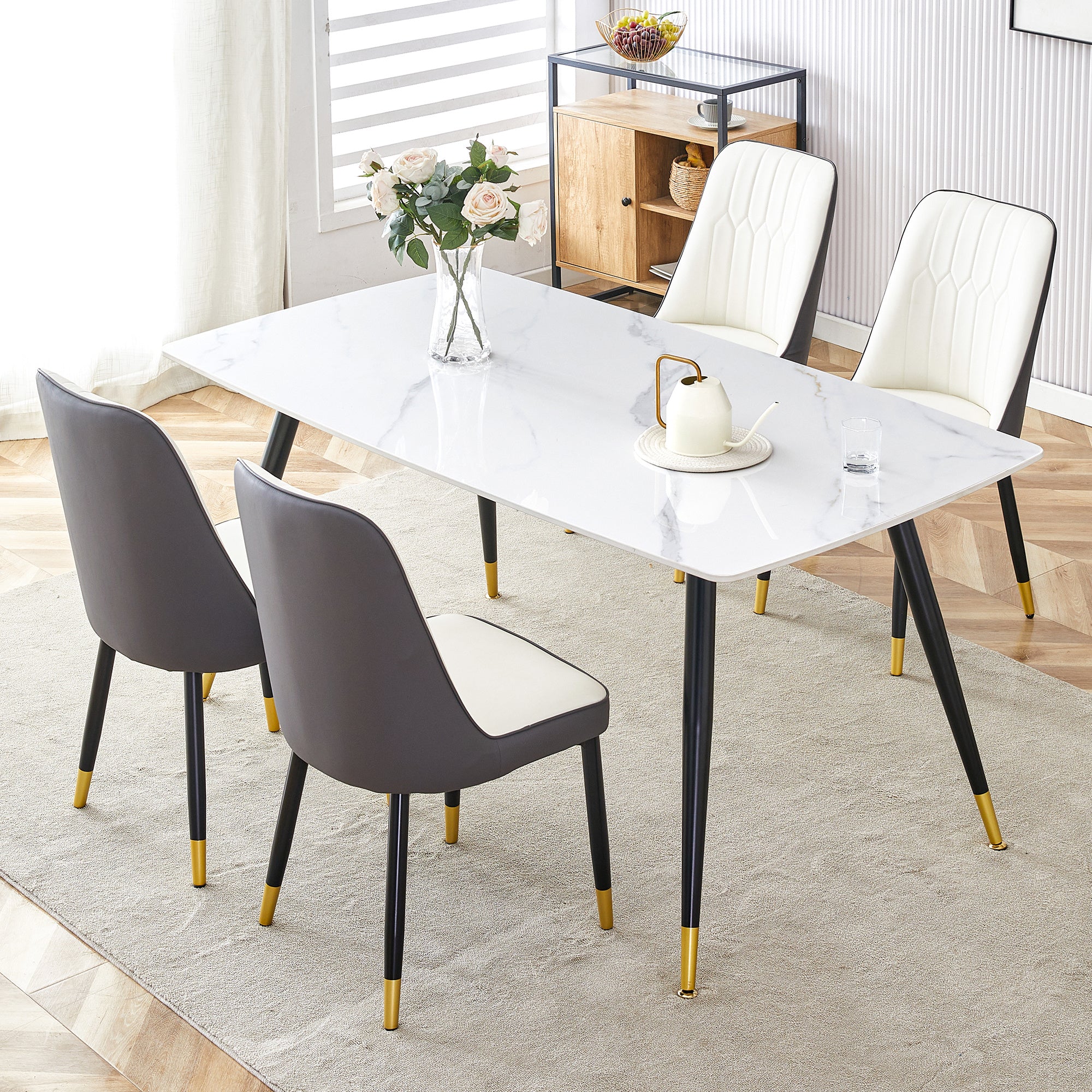 Modern minimalist dining table. White imitation marble pattern SINTERED STONE desktop with black metal legs.Modern dining chair with PU artificial leather backrest cushion and black metal legs.F-001