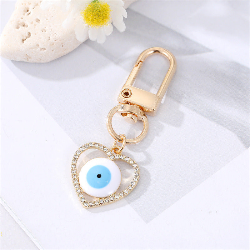 Dot Drilling Alloy Love Eye Keychain