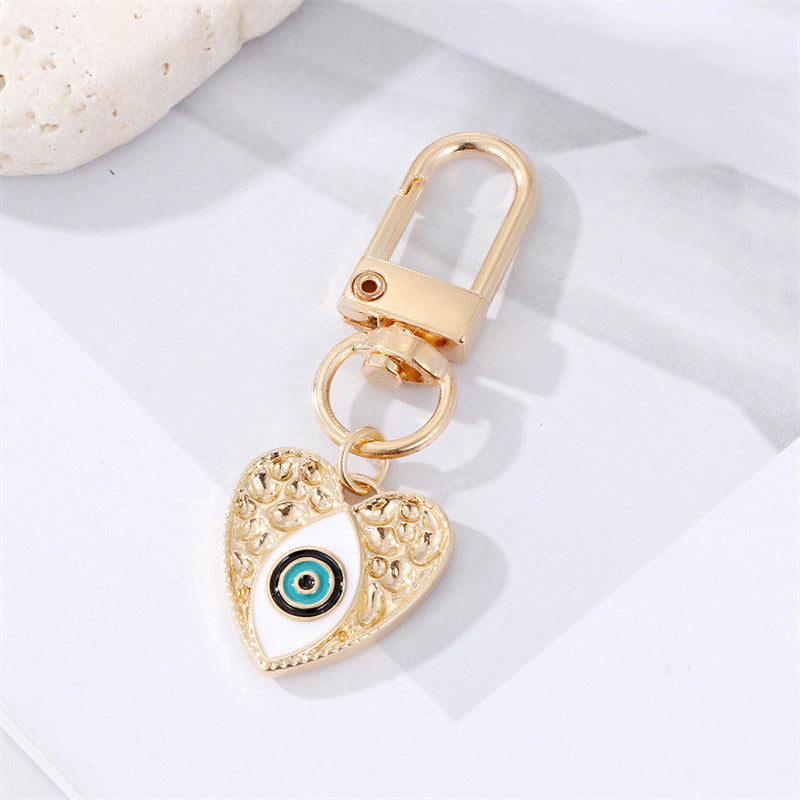 Dot Drilling Alloy Love Eye Keychain