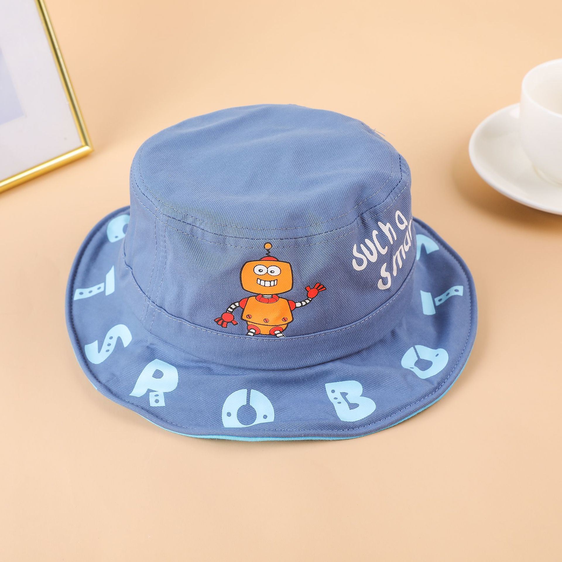 Boys spring and summer hat children's printing cute super cute fisherman hat baby cartoon little robot sun hat spring