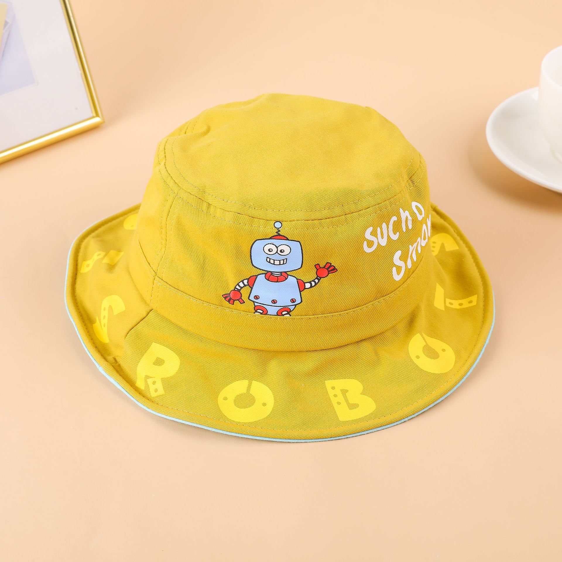 Boys spring and summer hat children's printing cute super cute fisherman hat baby cartoon little robot sun hat spring