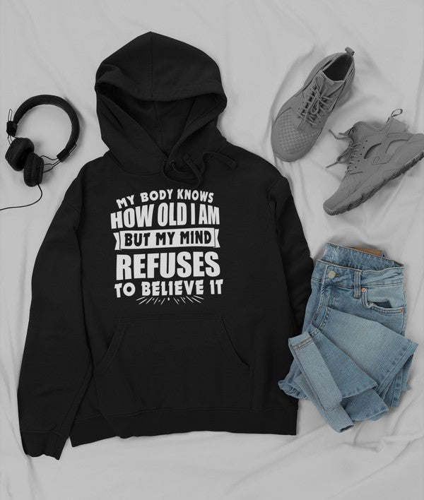 My Body Knows How Old I Am But My Mind Refuses to Believe It Hoodie