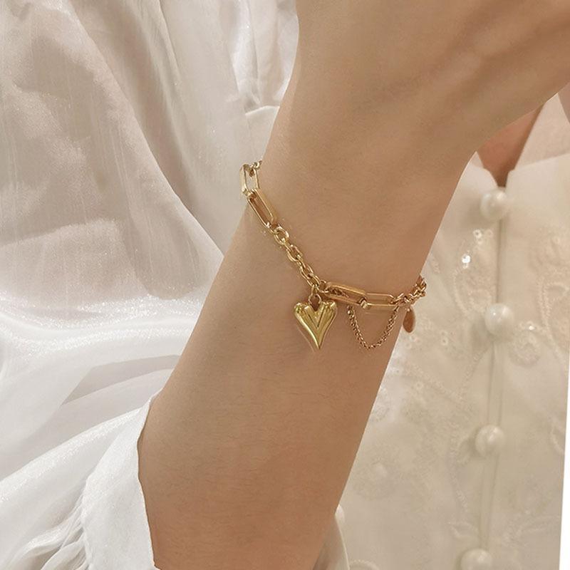 Europe and the United States wind tassel love heart necklace ins wind even pieces of jewelry titanium steel 18k gold love heart bracelet hand jewelry wholesale