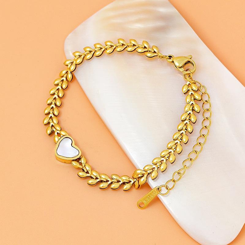 Original niche design exquisite titanium steel plated 18K gold natural love white mother-of-pearl shell bracelet female double-sided wearable