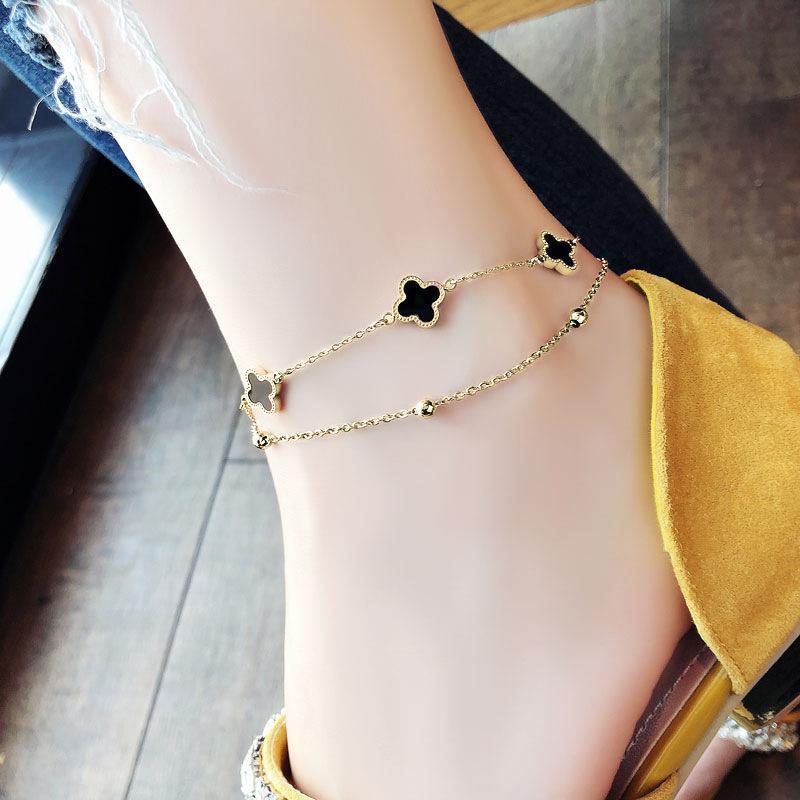 Titanium steel niche design anklet double layer four-leaf clover anklet female personality Korean version of the net red female models sexy jewelry wholesale