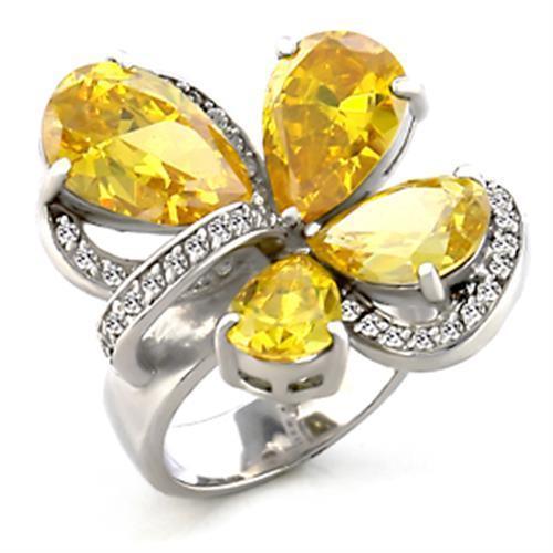 6X044 - Rhodium Brass Ring with AAA Grade CZ in Topaz