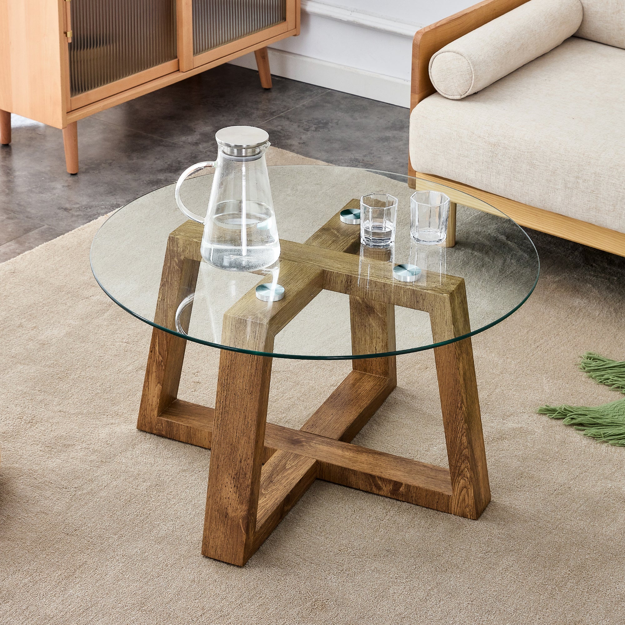 Modern practical circular coffee and tea tables. Made of transparent tempered glass tabletop and wood colored MDF material. Suitable for living rooms and bedrooms.31.5"*31.5"*17.7"